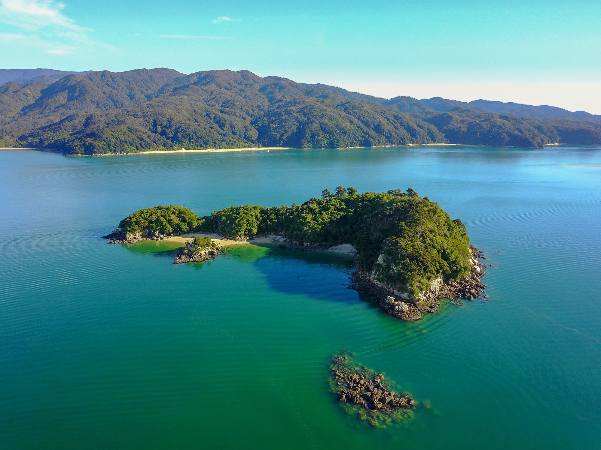 Aerial view of Fisherman Island in turquoise water