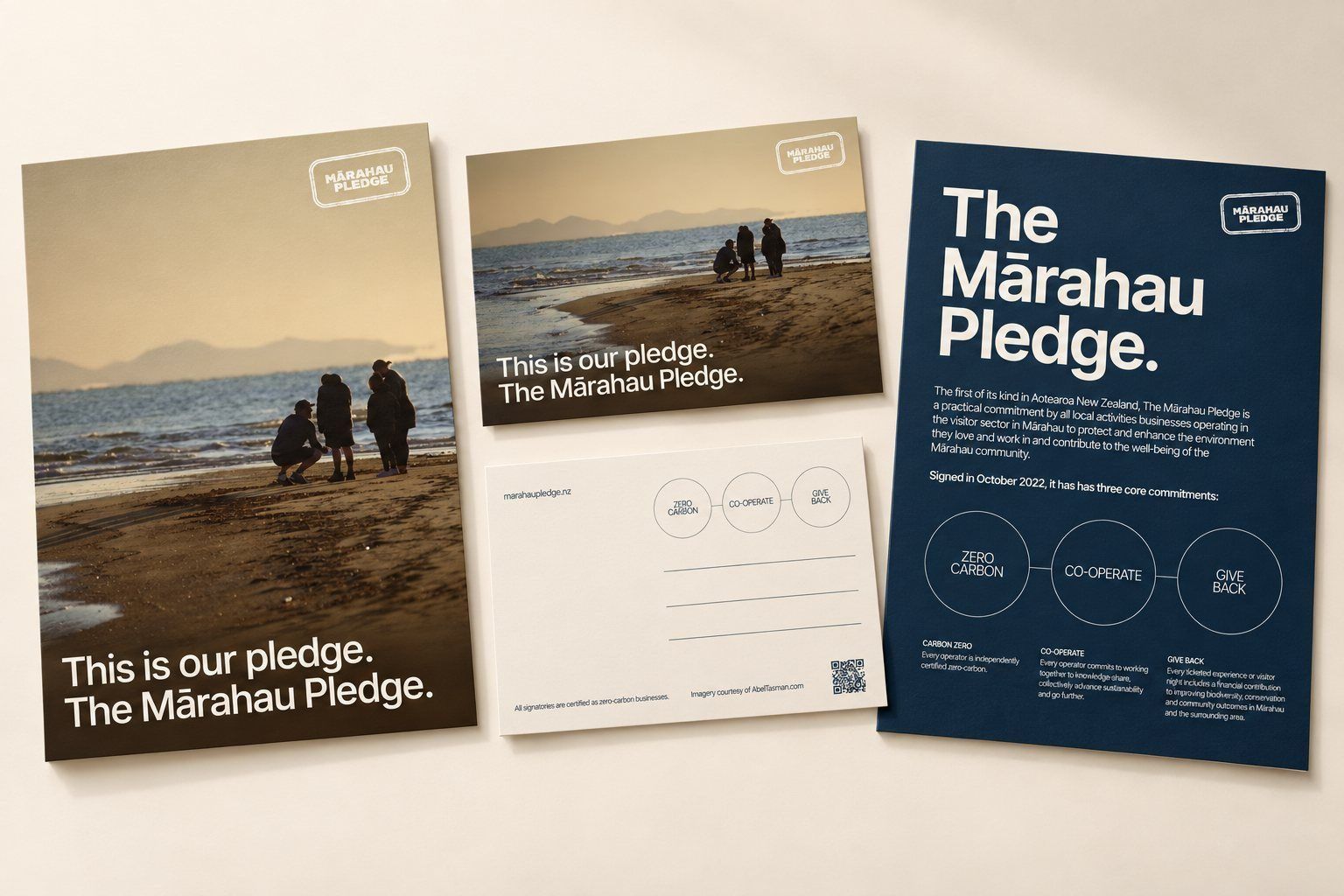The Mārahau Pledge poster, postcard and explainer laid out together on a cream ground